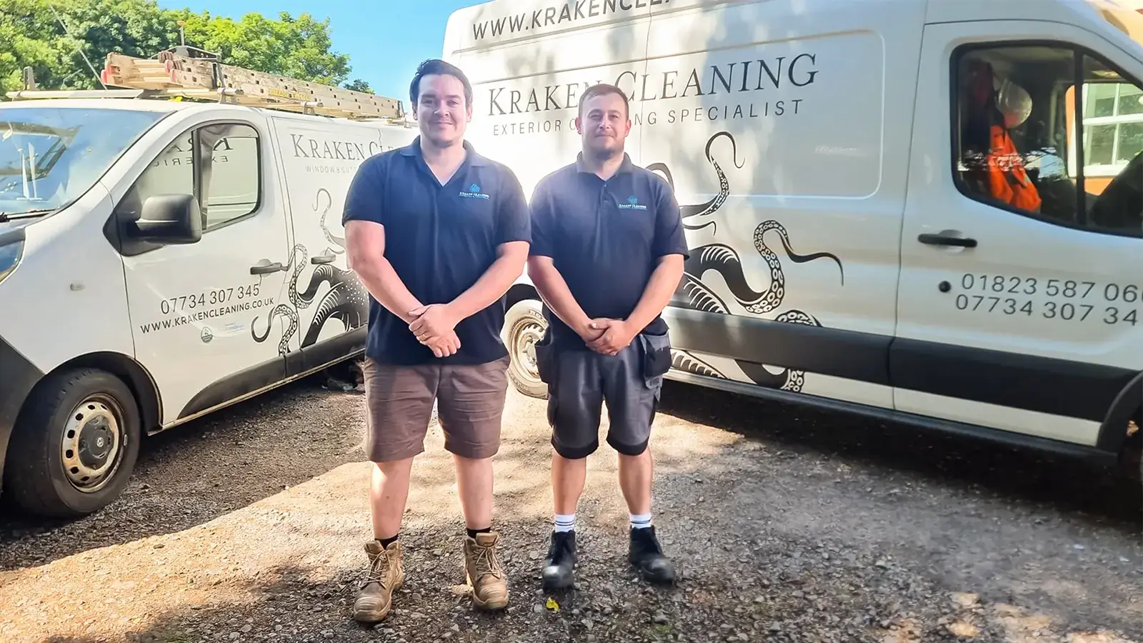 Kraken Gutter Cleaning Team and Vans